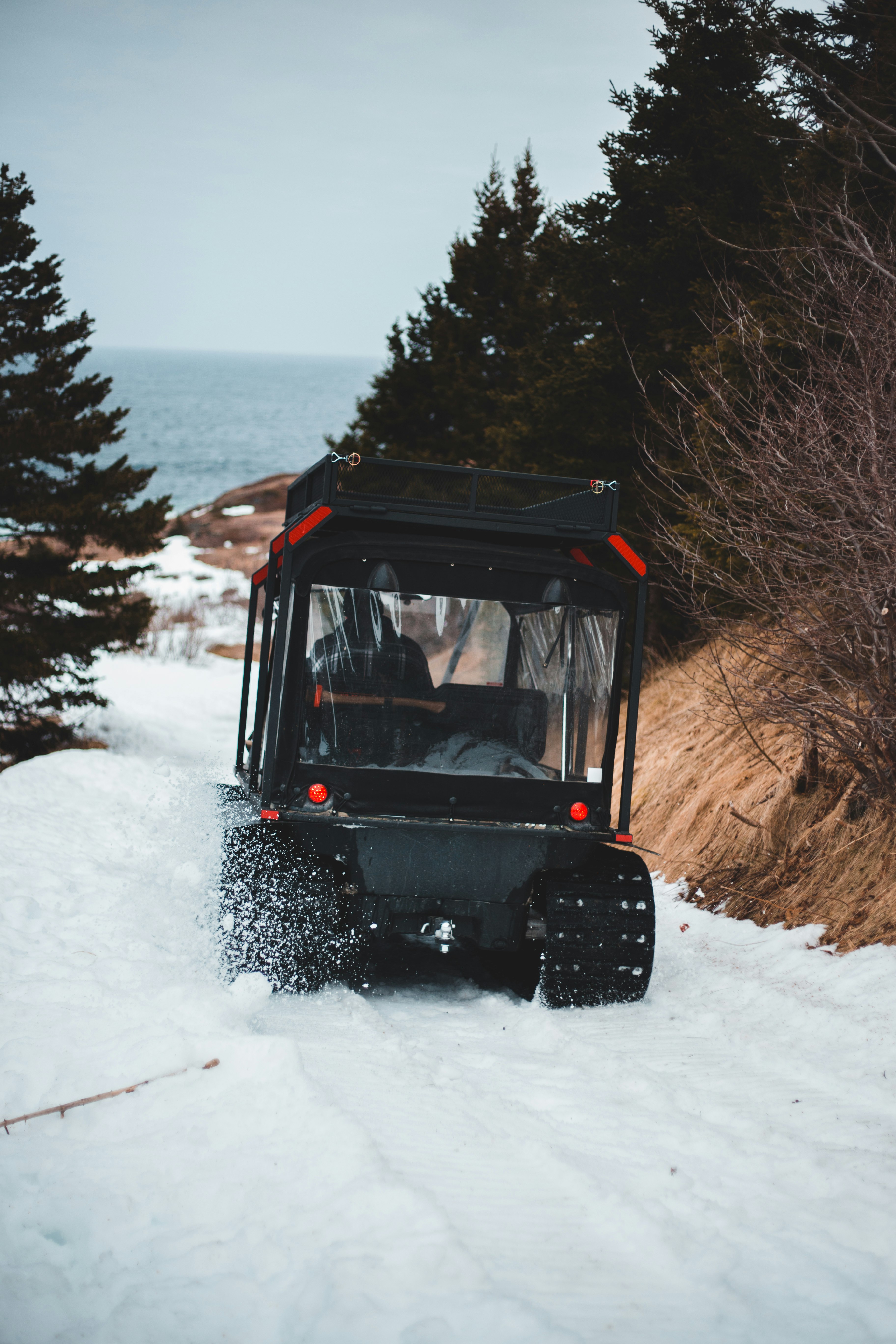 black jeep wrangler on snow covered ground during daytime